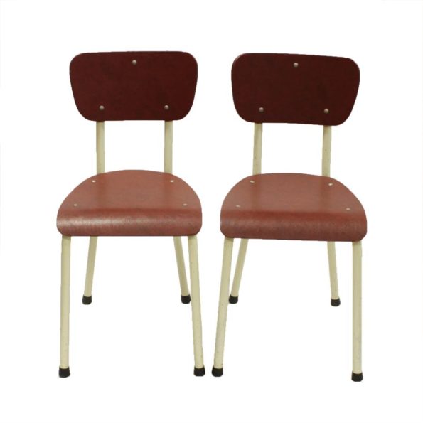 Twee rode vintage Brabantia-stoelen
