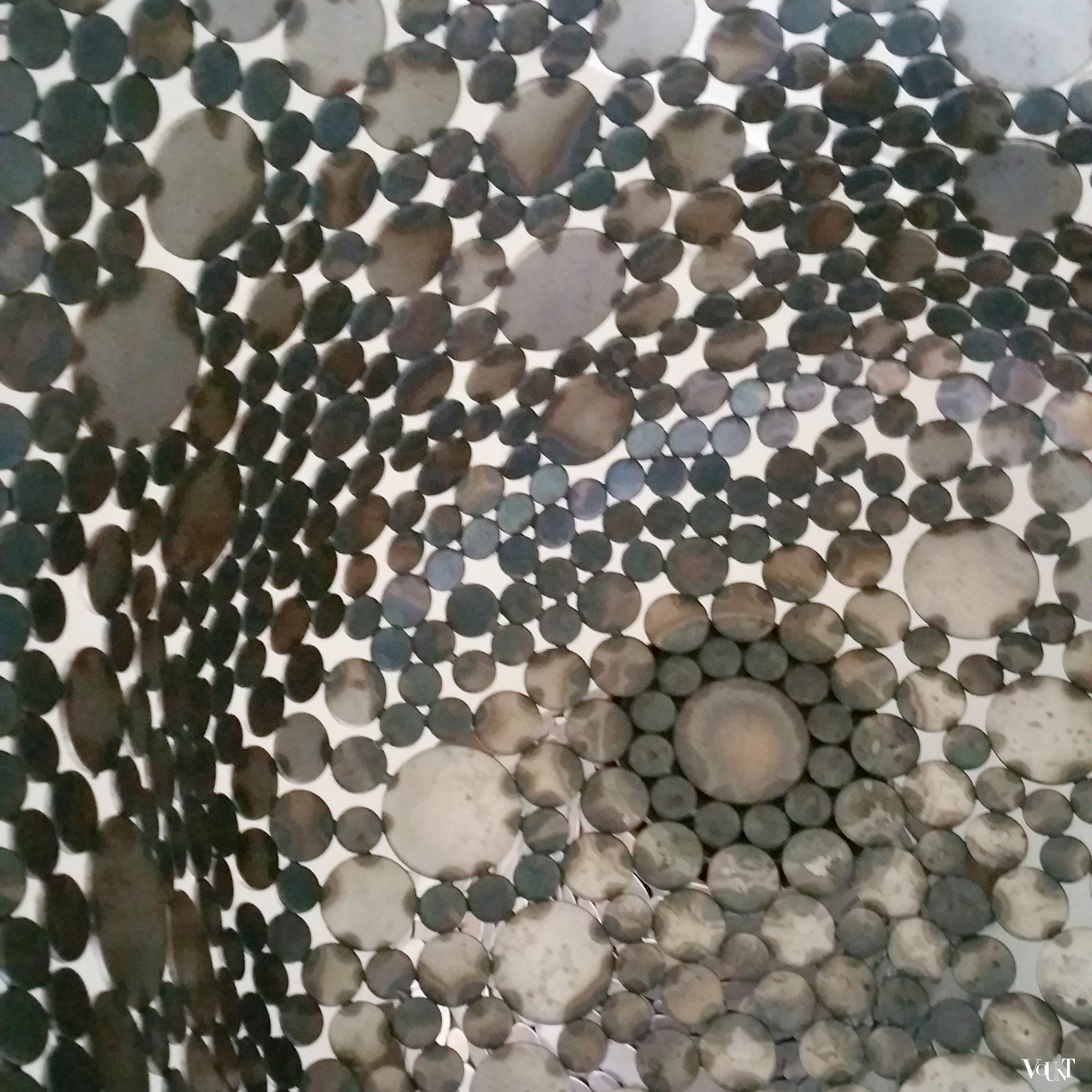 Draaifauteuil metalen schijfjes, begin 2000