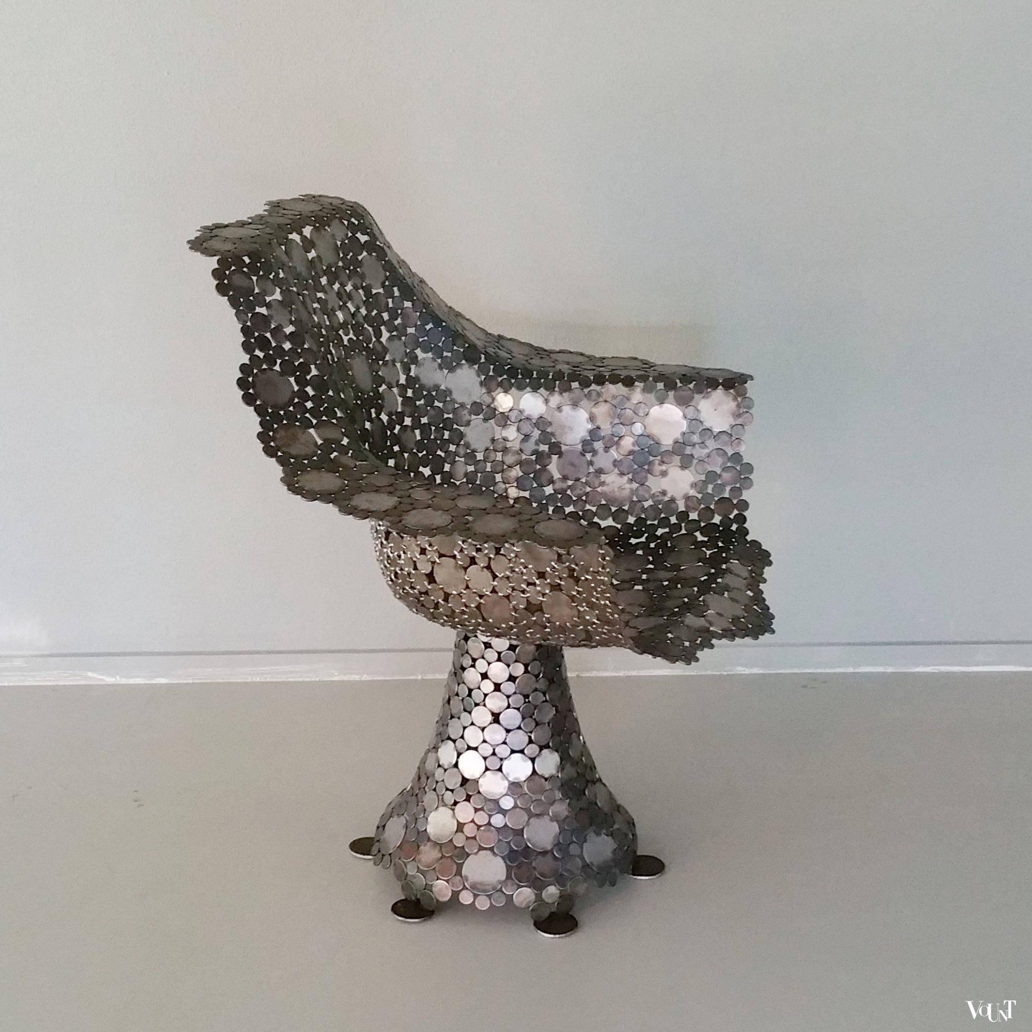 Draaifauteuil metalen schijfjes, begin 2000