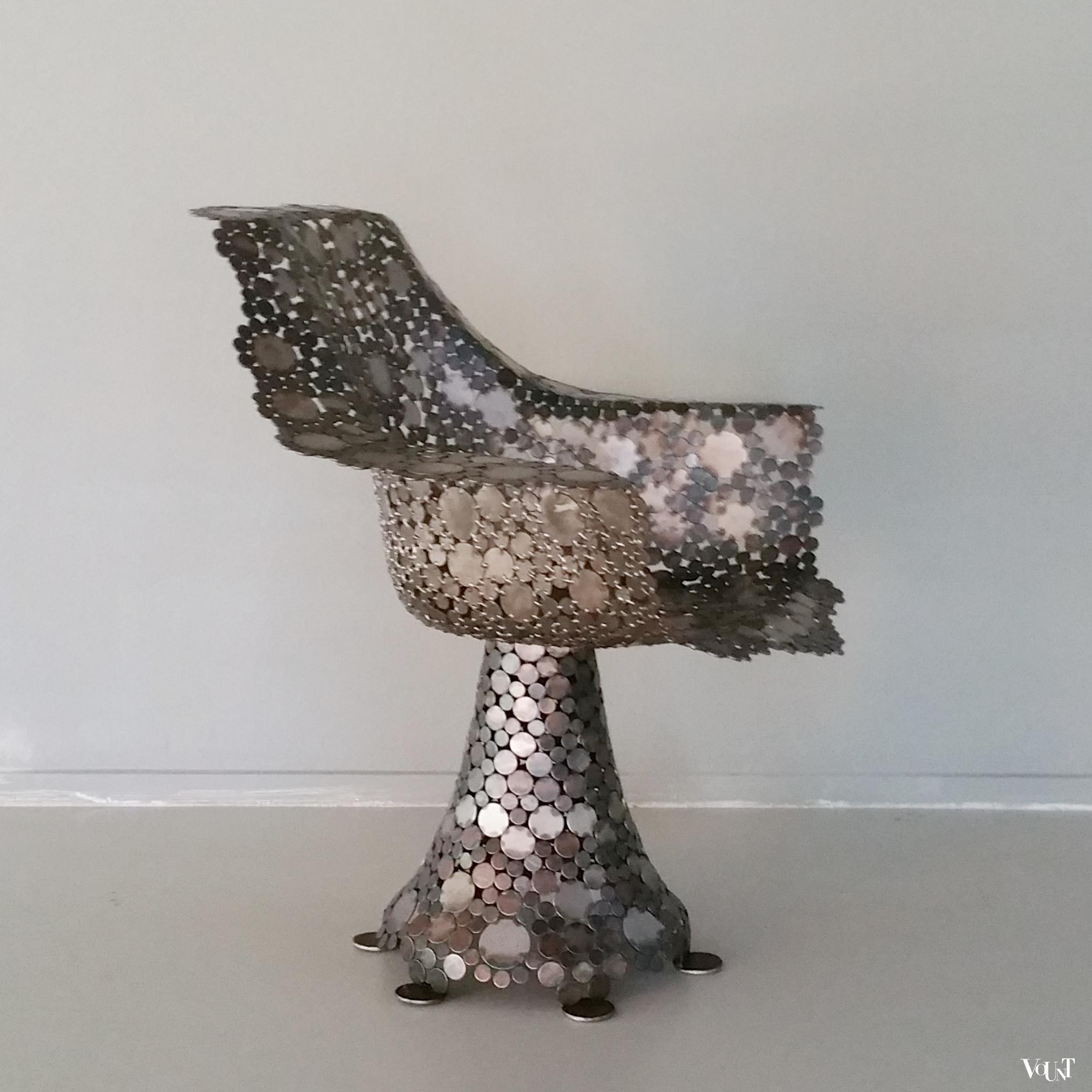 Draaifauteuil metalen schijfjes, begin 2000