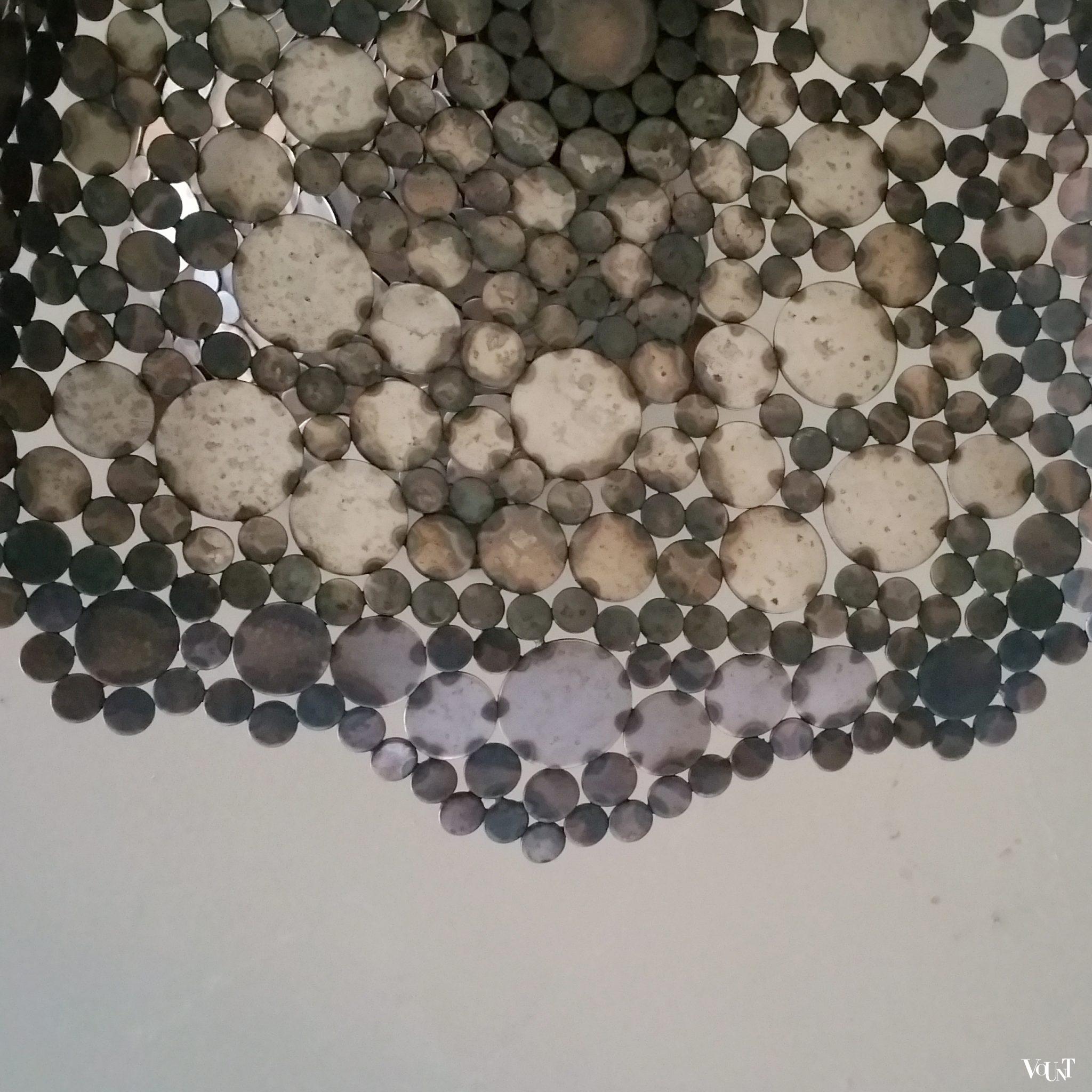 Draaifauteuil metalen schijfjes, begin 2000