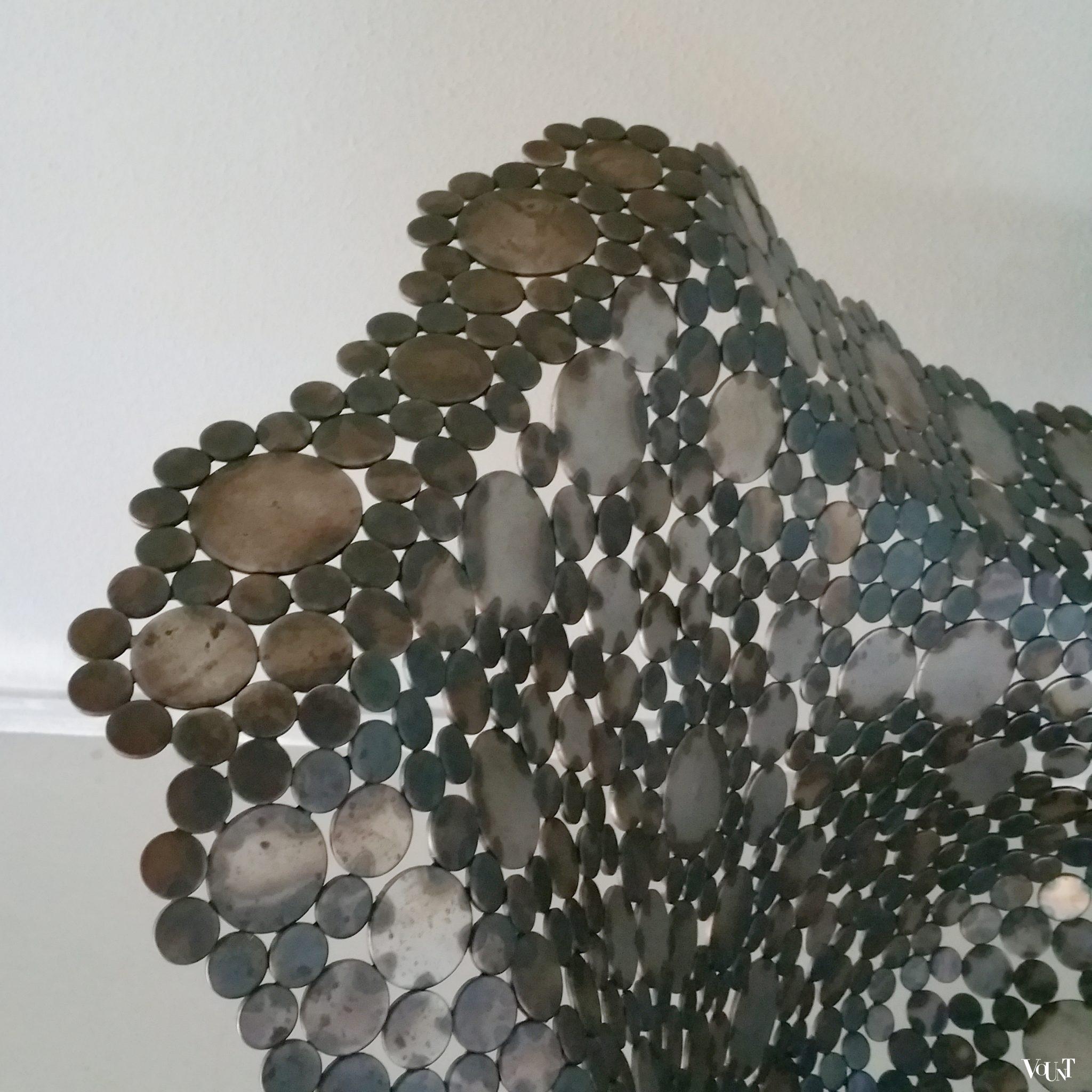 Draaifauteuil metalen schijfjes, begin 2000