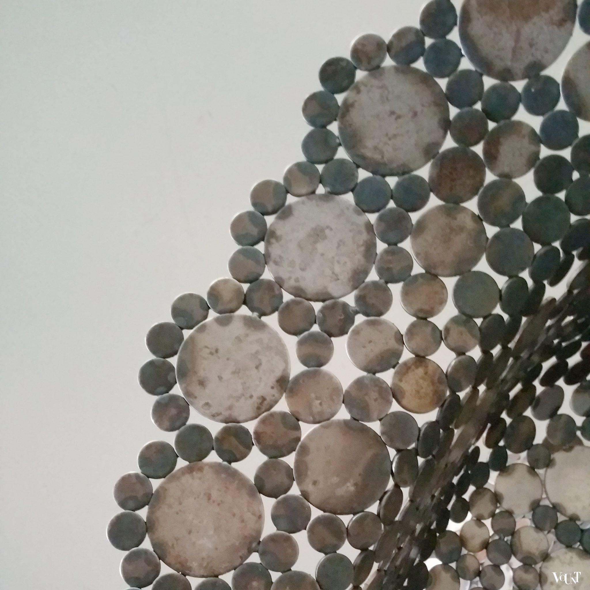 Draaifauteuil metalen schijfjes, begin 2000