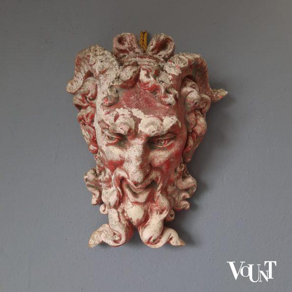 Oud zandstenen ornament sater- / satyr-hoofd