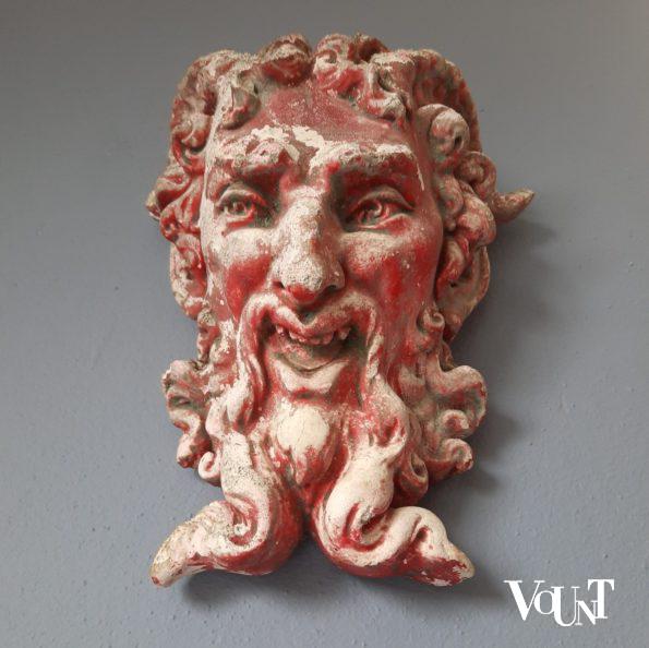 Oud zandstenen ornament sater- / satyr-hoofd