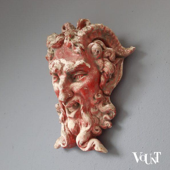 Oud zandstenen ornament sater- / satyr-hoofd