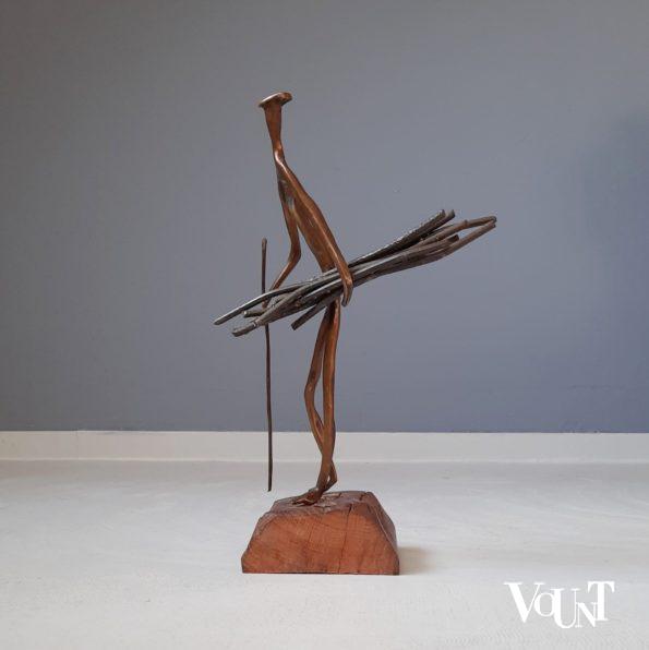 Modernistisch bronzen figuur houtsprokkelaar, Yves Lohé