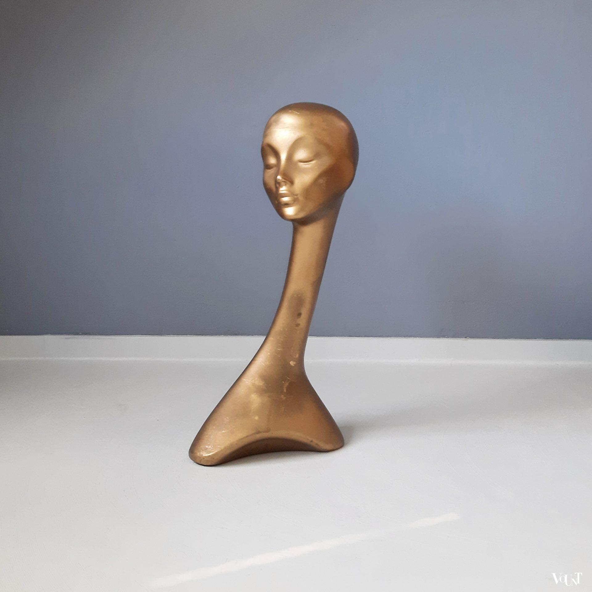 Goudkleurige "zwanenhals" mannequin, jaren '60/'70