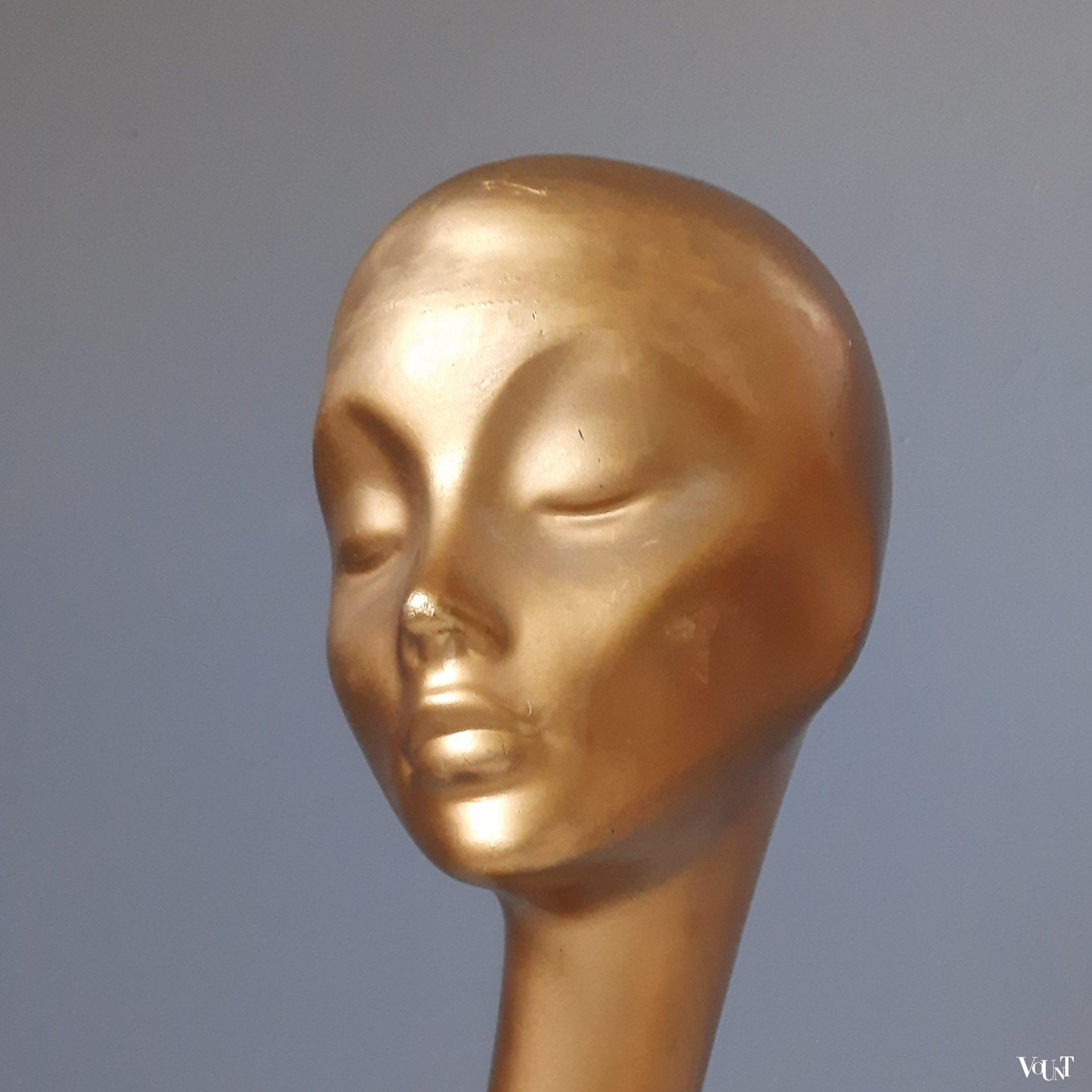 Goudkleurige "zwanenhals" mannequin, jaren '60/'70