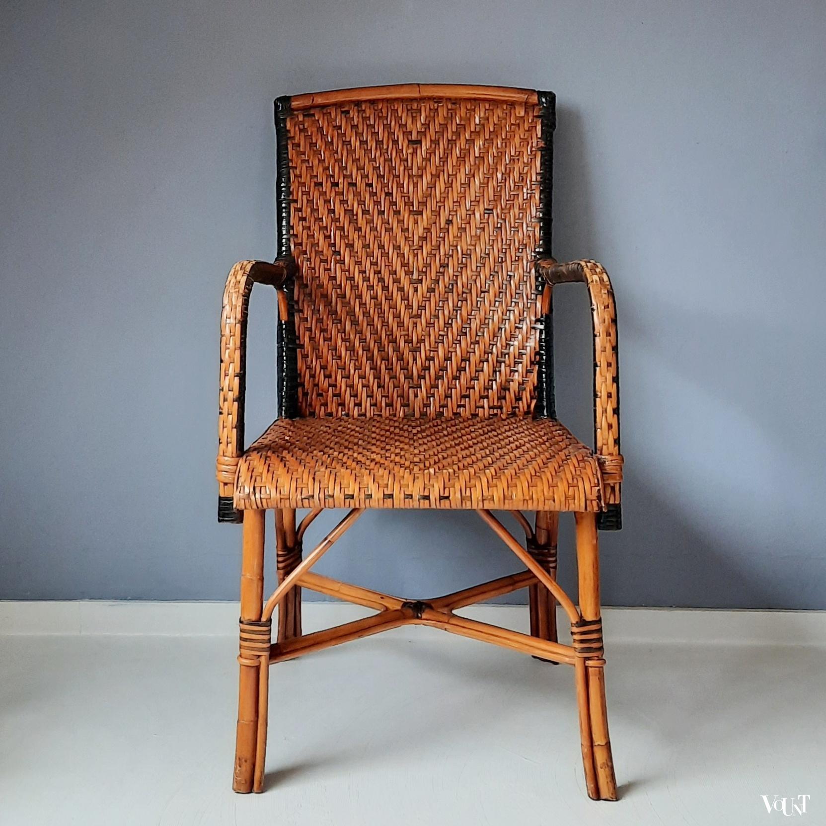 Vintage rotan stoel met zwarte accenten, jaren '60