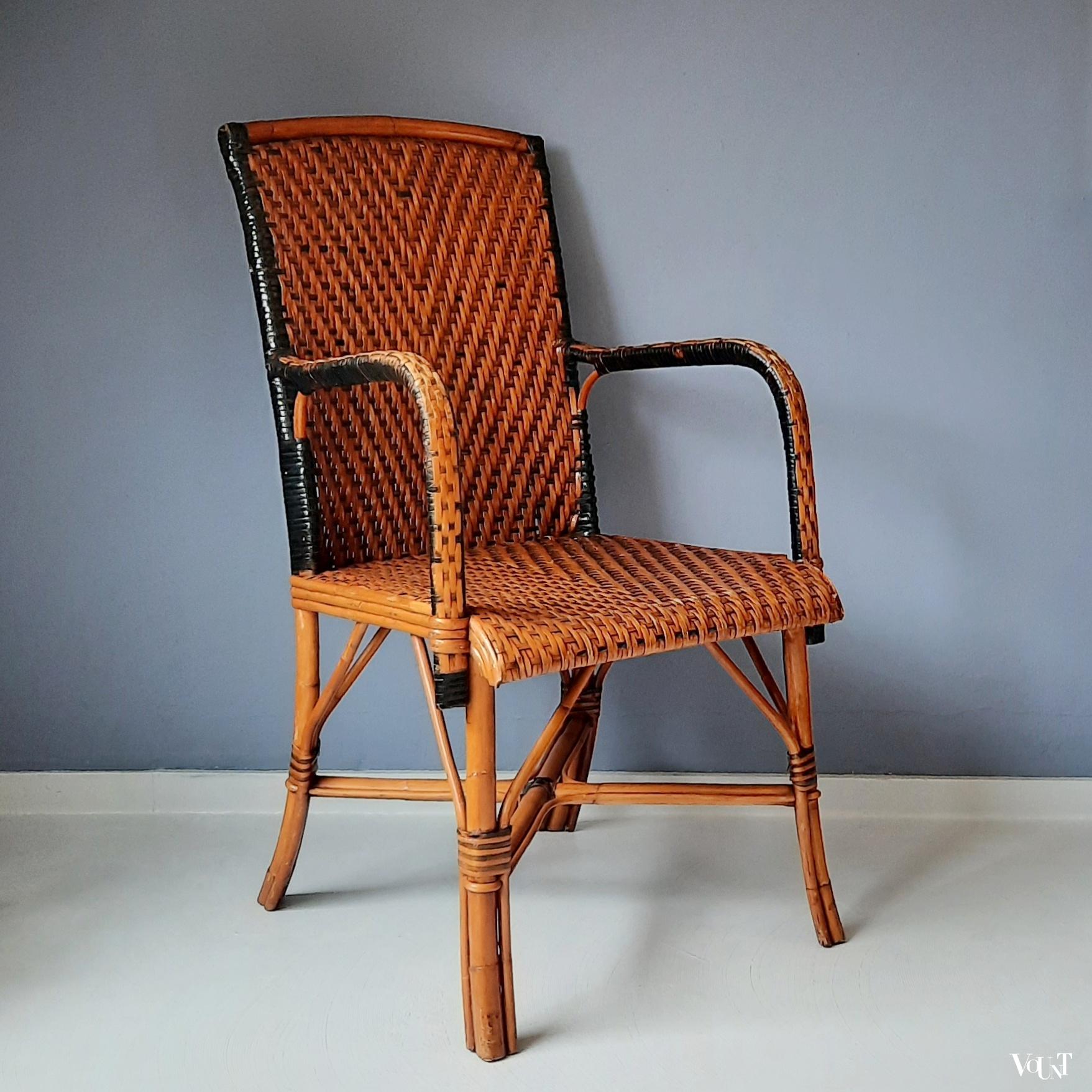 Vintage rotan stoel met zwarte accenten, jaren '60