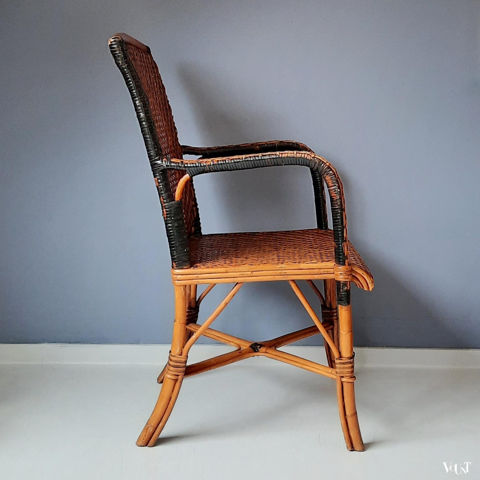 Vintage rotan stoel met zwarte accenten, jaren '60