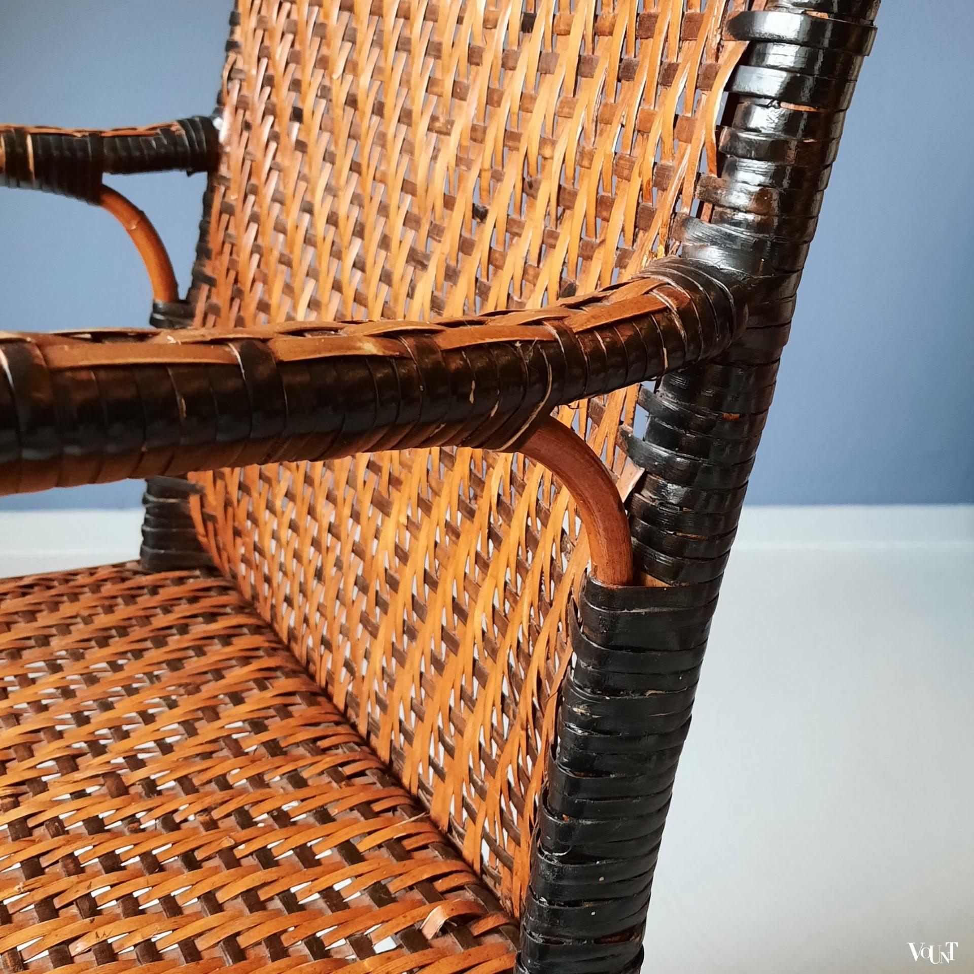 Vintage rotan stoel met zwarte accenten, jaren '60